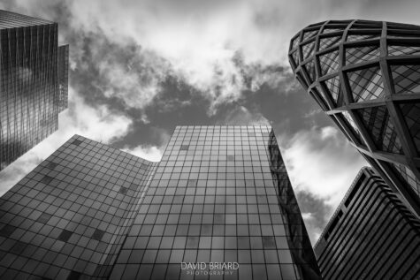 Low-Angle View of Glass and Steel Towers in La Défense Business District © David Briard